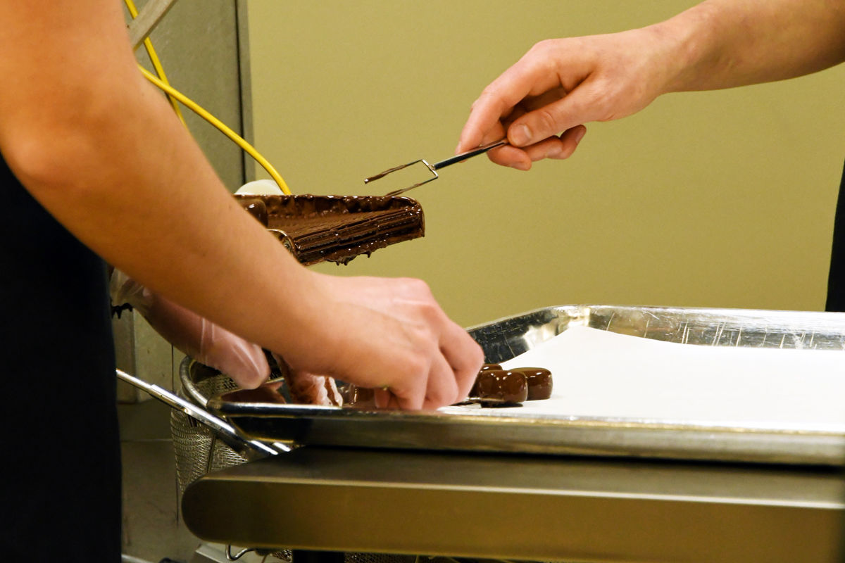 064 The Fun Club viewed the steps in making delicious chocolates.JPG